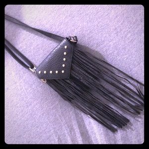 Crossover purse with gold studs and a cute fringe